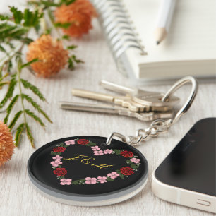 Black acrylic keychain with pink and red heart