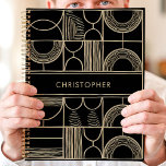 Black and Gold Geometric Custom Name Planner<br><div class="desc">This sleek planner design features a striking black background with a bold geometric pattern in shimmering gold accents. The modern layout highlights a custom name in the centre, making it both stylish and personalized. Ideal for professionals, students, or anyone who appreciates contemporary design. Perfect for organizing daily tasks, appointments, or...</div>