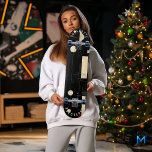 Black and Gold Minimalist Geometric Skateboard<br><div class="desc">This striking skateboard design features a bold black backdrop accentuated with sleek gold geometric shapes and lines. Its minimalist aesthetic captures a contemporary edge, blending urban sophistication with modern abstract art. The clean and precise design is perfect for skaters who value style and creativity in their gear. Whether you're cruising...</div>