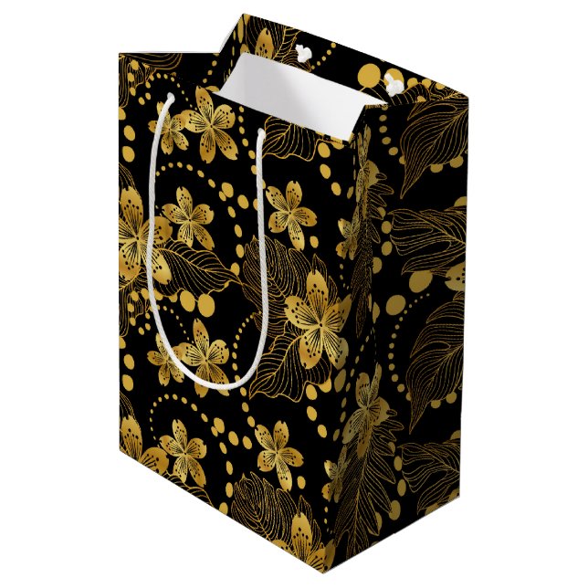 Black and gold Tropical leaves and flowers pattern Medium Gift Bag (Back Angled)