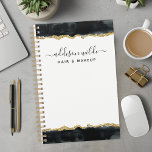 Black And Gold Watercolor Business Planner<br><div class="desc">Elevate your professional style with this black and gold watercolor business personalized planner. Perfect for women in the beauty industry, this planner combines elegant design with practical functionality. The luxurious gold accents and chic watercolor artwork add a touch of sophistication to your daily organization. Personalize it with your name for...</div>