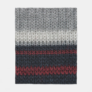 Black and grey knitting wool with red and white st fleece blanket