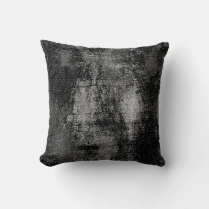 Black and grey material skinned with oil paint throw pillow