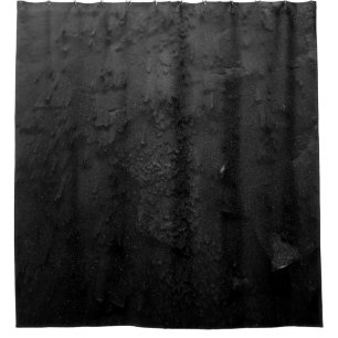 Black and grey stone fragment