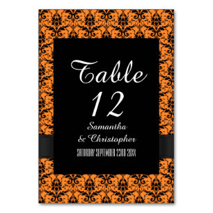 Black and orange damask pattern table number
