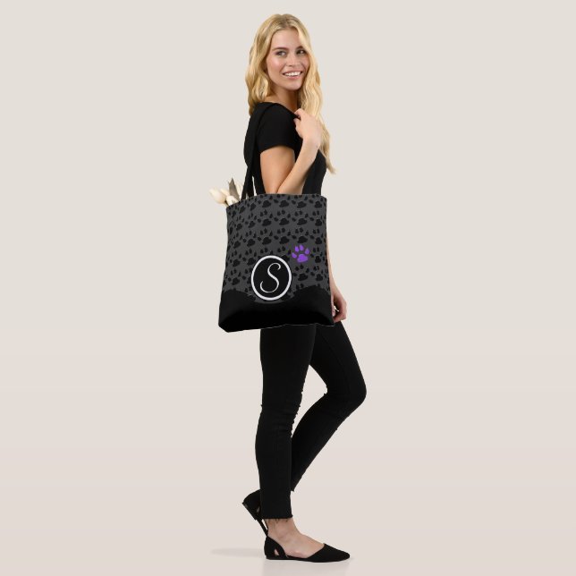 Black and Purple Paw Print Monogram Tote Bag (On Model)