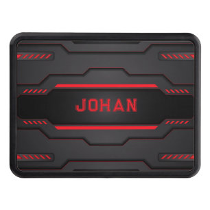 Black and red metallic geometric design trailer hitch cover