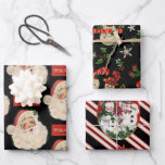 Black And Red Vintage Christmas  Wrapping Paper Sheet<br><div class="desc">A fun trio of retro Santa and snowman couples with black backgrounds.</div>