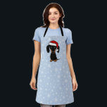 Black and Tan Dachshund Santa Cute Dog Christmas Apron<br><div class="desc">Bring some canine Christmas cheer into the kitchen with this adorable holiday baking apron! The front features a large print cartoon-style drawing of a black and tan dachshund wearing a bright red Santa hat atop its cute floppy ears. This adorable doxie apron is the perfect accessory for baking up batches...</div>