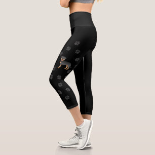 Black And Tan Rottweiler Cute Cartoon Dog And Paws Capri Leggings