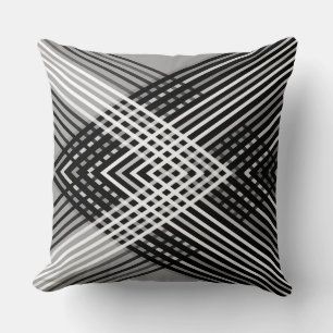 Black and white and grey intertwined stripes on a throw pillow