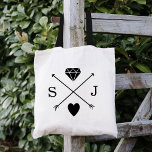 Black and White Arrow Wedding Monogram Tote Bag<br><div class="desc">Cute trendy wedding monogram tote bags with a personalized logo featuring crossed arrows with a cool diamond and heart symbol and the bride and groom's monogram initials. Great for party favours or guest welcome tote bags! Click the "Customize It" button to personalize with your wedding date, names or other custom...</div>