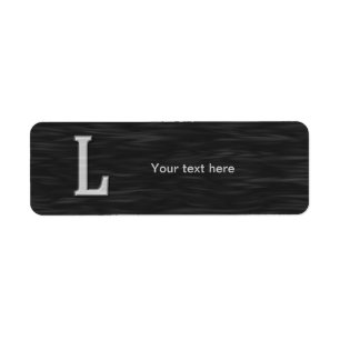 Black and white beveled "L" label