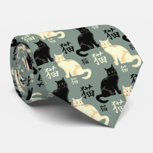 Black and white cats with japanese characters tie