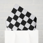 Black and White Chequered | Race Car Theme Tissue Paper<br><div class="desc">Add a bold finish to your race day celebration with this Black & White Chequered Tissue Paper! Featuring a classic racing-inspired pattern with a modern twist, this tissue paper pairs perfectly with your Fast ONE birthday theme or any car-loving celebration. Use it to line gift bags, wrap fragile items, or...</div>