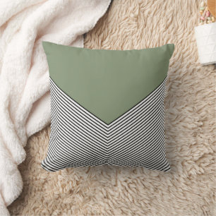 Black and white chevron design and green triangle throw pillow
