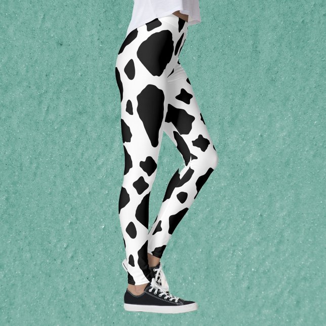 Black and White Cow Print Pattern Cute Leggings (A pair of leggings with a fun black and white cow pattern.)