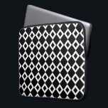 Black and White Diamond Pattern Laptop Sleeve<br><div class="desc">A bold,  graphic pattern of interlocking black and white diamond shapes. The white diamonds each contain a small black diamond making black the dominant colour of the original design. 


 Digitally created image. 
 Copyright © 2013 Claire E. Skinner. All rights reserved.</div>