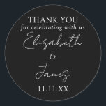 Black And White Elegant Script Wedding Thank You Classic Round Sticker<br><div class="desc">This black and white minimalist elegant script wedding thank you sticker can be personalized with your information in chic typography. Designed by Thisisnotme©</div>