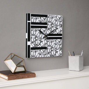 Black and White Faces Wall Clock
