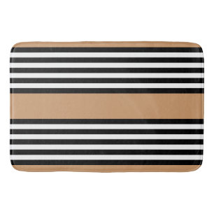 Black and white five stripe pattern with tan bath mat