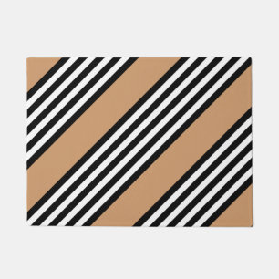 Black and white five stripe pattern with tan doormat