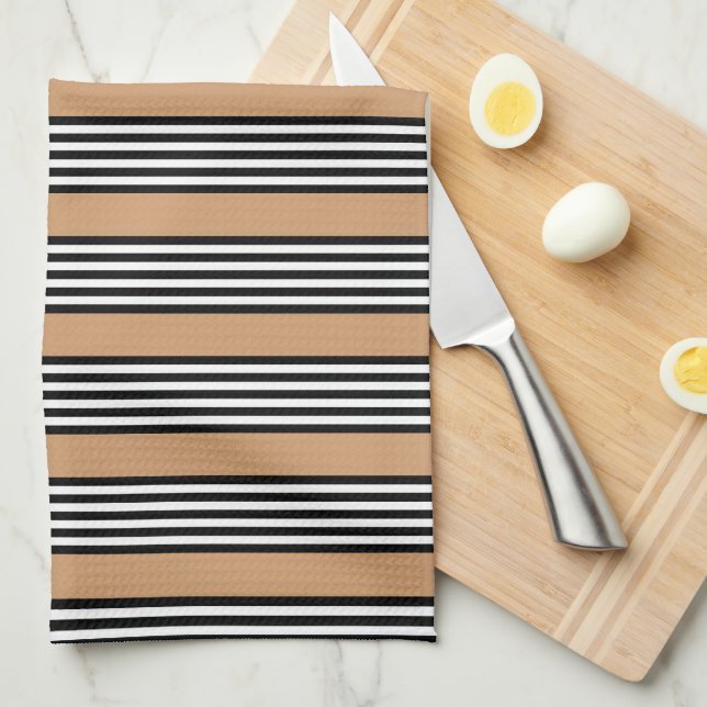 Black and white five stripe pattern with tan kitchen towel (Quarter Fold)