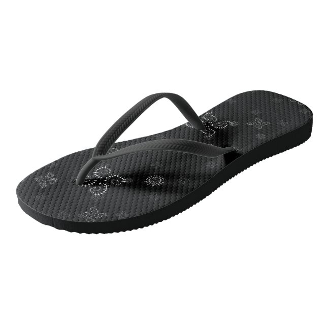 Black and white geometric flip flops (Angled)