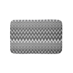 Black and white geometric zigzag pattern bath mat