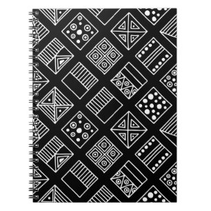 Black and white geometrical background with hand d notebook