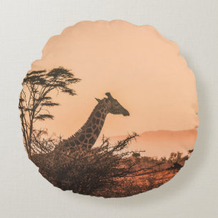 BLACK AND WHITE GIRAFFE ON BROWN GRASS FIELD ROUND PILLOW