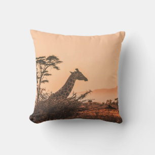 BLACK AND WHITE GIRAFFE ON BROWN GRASS FIELD THROW PILLOW