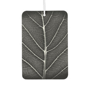 Black and white glowing leaf close-up air freshener
