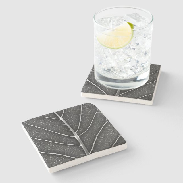 Black and white glowing leaf close-up stone coaster (Side)