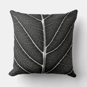 Black and white glowing leaf close-up throw pillow