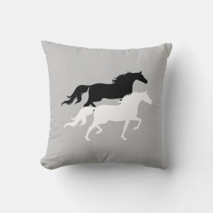 Black and white horse silhouettes on silver grey throw pillow