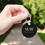 Black and White Minimalist Modern Monogram Keychain<br><div class="desc">Introducing our Black and White Minimalist Modern Monogram Collection: Embrace simplicity and sophistication with our minimalist designs, curated to elevate your style effortlessly. Crafted with a keen eye for modern aesthetics, this collection features sleek black and white designs accentuated by personalized monograms. From chic stationery to versatile accessories, our collection...</div>
