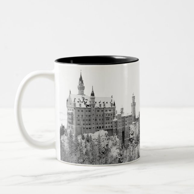 Black and White Neuschwanstein Castle in Winter Two-Tone Coffee Mug (Left)