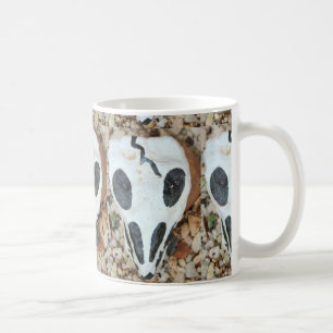 black and white painted skull coffee mug