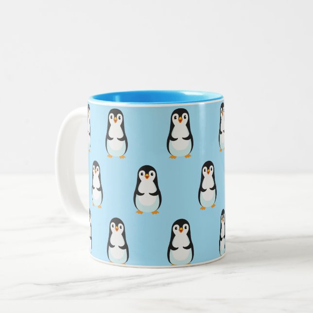 Black and White Penguin Pattern on Light Blue Two-Tone Coffee Mug (Front Left)