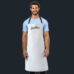 Black and white Personalized Name Apron<br><div class="desc">Elevate your gift-giving with our Personalized Modern Apron, a perfect blend of style and functionality. This apron is an excellent choice for anyone who loves cooking, baking, or any culinary adventure. Personalize this apron with a name, making it a unique and thoughtful gift. The black and white design is both...</div>