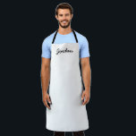 Black and white Personalized Name Apron<br><div class="desc">Elevate your gift-giving with our Personalized Modern Apron, a perfect blend of style and functionality. This apron is an excellent choice for anyone who loves cooking, baking, or any culinary adventure. Personalize this apron with a name, making it a unique and thoughtful gift. The black and white design is both...</div>