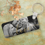 Black and White Photo Elegant Gold Script Love Keychain<br><div class="desc">Personalize with your favorite photo,  featuring a beautiful gold script font with the word love,  creating a unique memory and gift to treasure! Designed by Thisisnotme©</div>