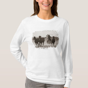 Black and White photo of a Cowboy Lassoing Horses T-Shirt