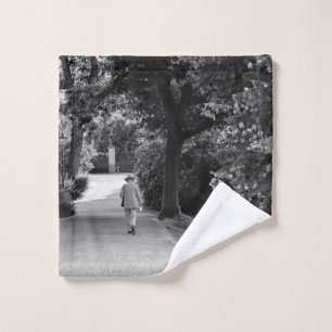 Black and white photo of old man at park