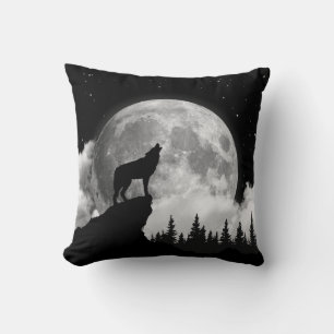 Black and white wolf howling at the moon throw pillow