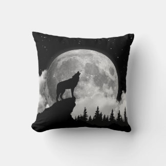 Black and white wolf howling at the moon throw pillow