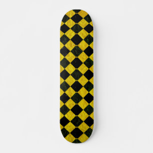 Black and yellow chequered pattern skateboard
