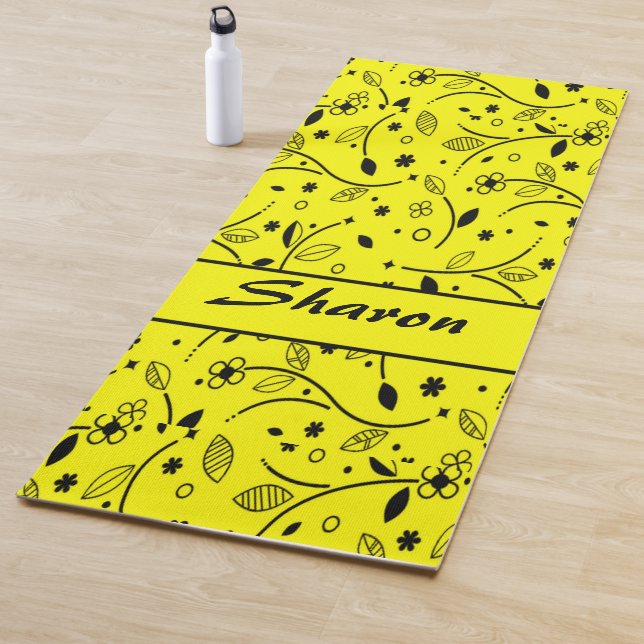 Black and yellow floral print yoga mat (In Situ)