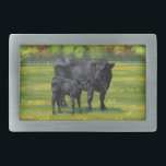 Black Angus Cow & Cute Calf in Summer Pasture Belt Buckle<br><div class="desc">The Black Angus is a Scottish breed of beef cattle that originated from cattle breeds native to Aberdeen, Banff, Kincardine, and Angus in north-eastern Scotland. Their colour is always solid black, and they do not have horns. It is a small, stocky breed that is popular for its ruggedness and high...</div>